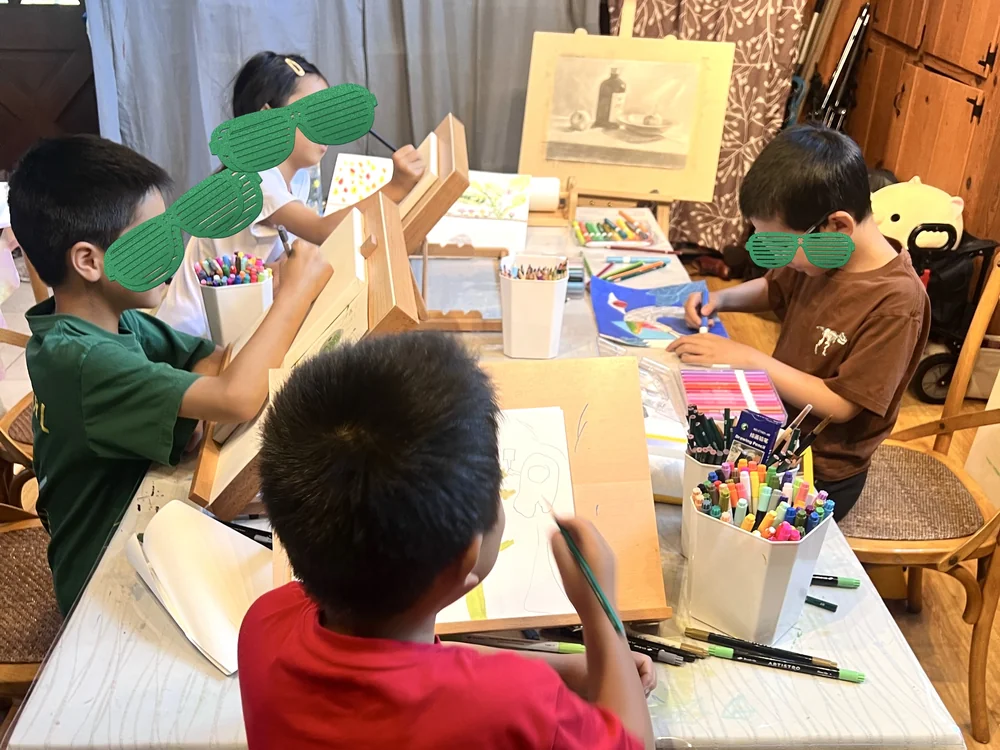 Student painting in bright colors